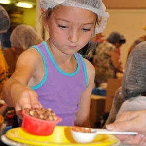 Child Volunteering | Meals of Hope Marco Island - Meal Packing to End Hunger